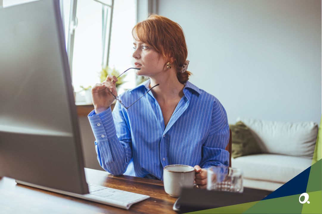 Professional woman looking dreamily away