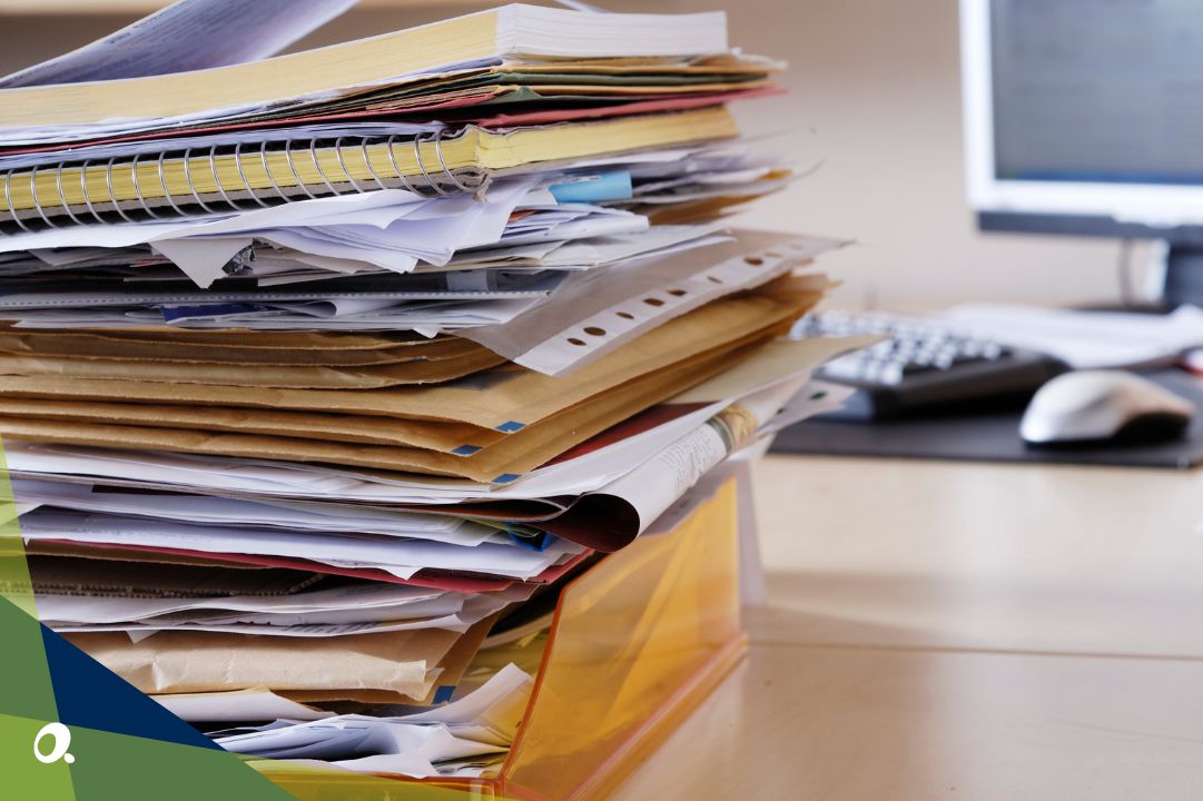 Piles of reports on a desk