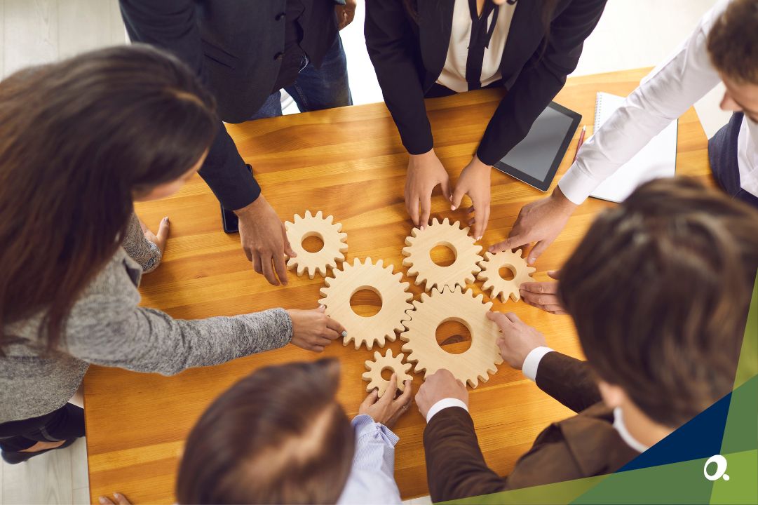 A team collaborating around a desk