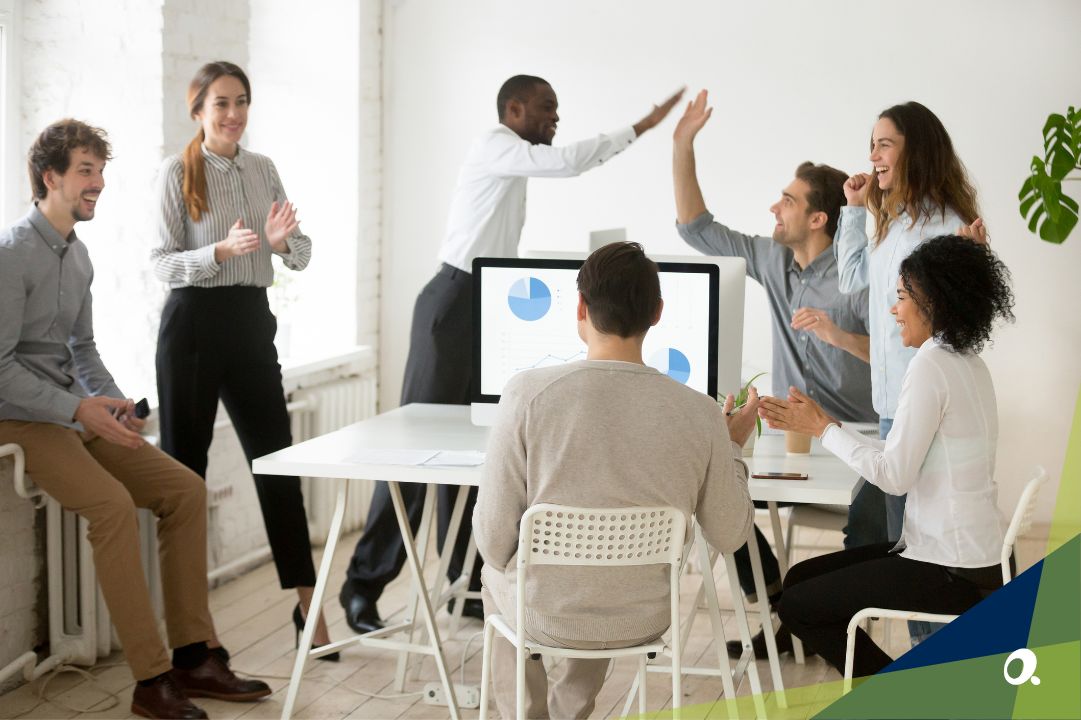 Business team reviewing reports in a modern office environment.