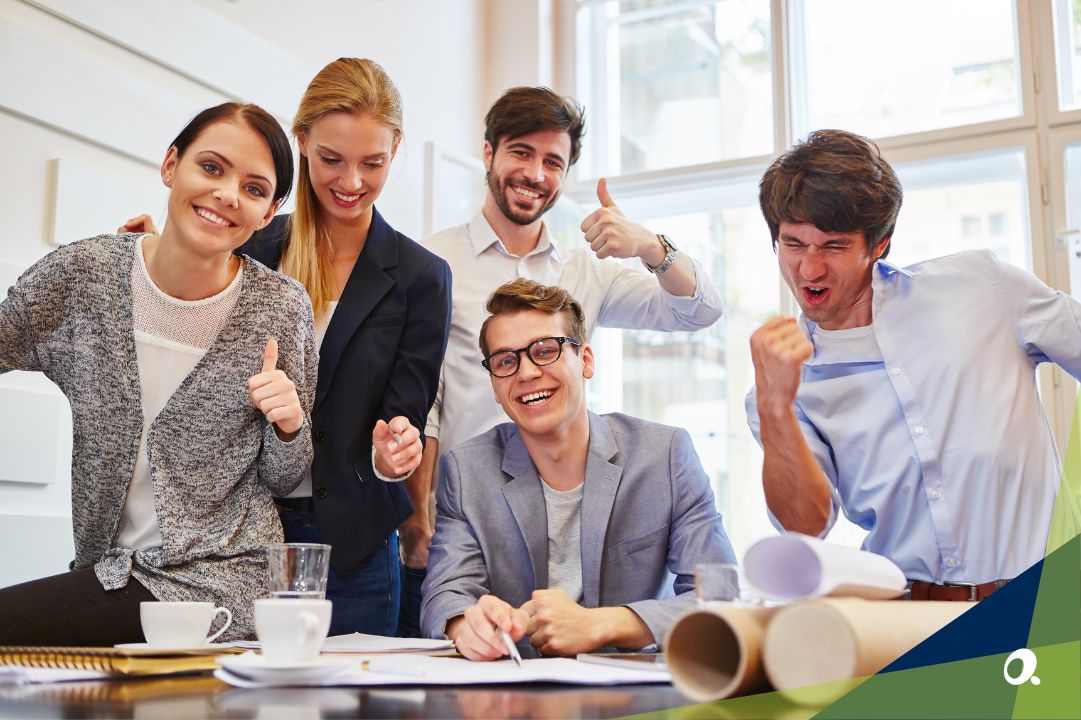 Finance team cheering after implementing an integrated financial system