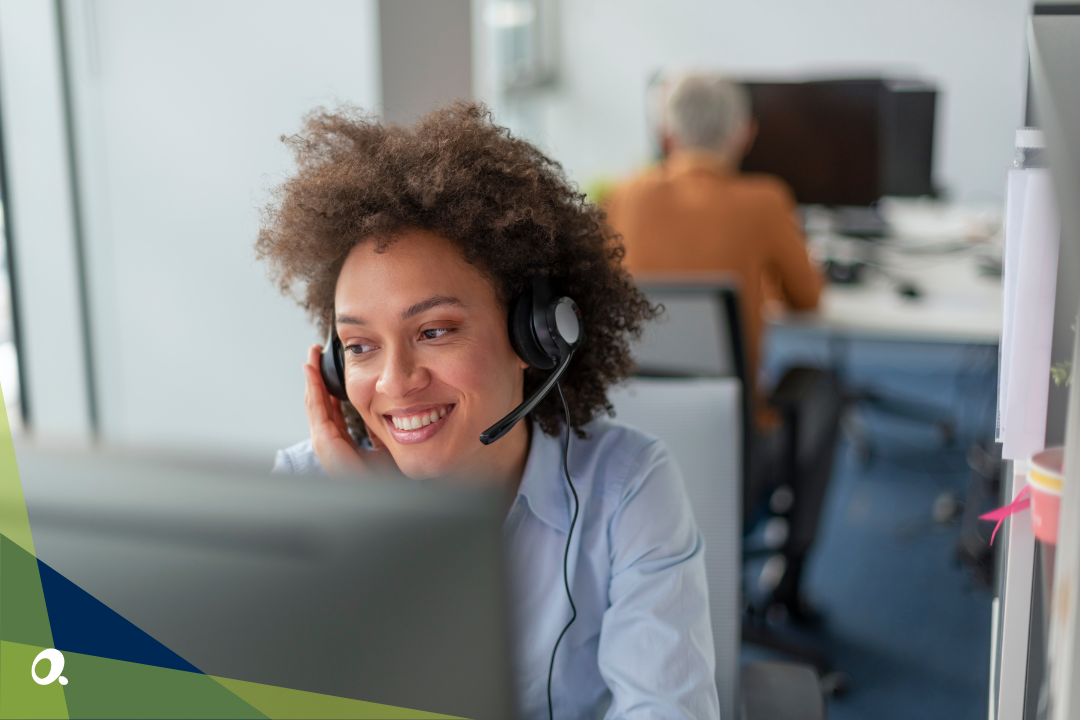 A customer support agent smiling