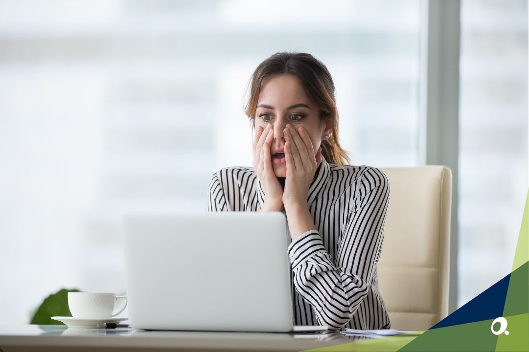 A concerned businesswoman encountering a potential pitfall while working on financial software integration