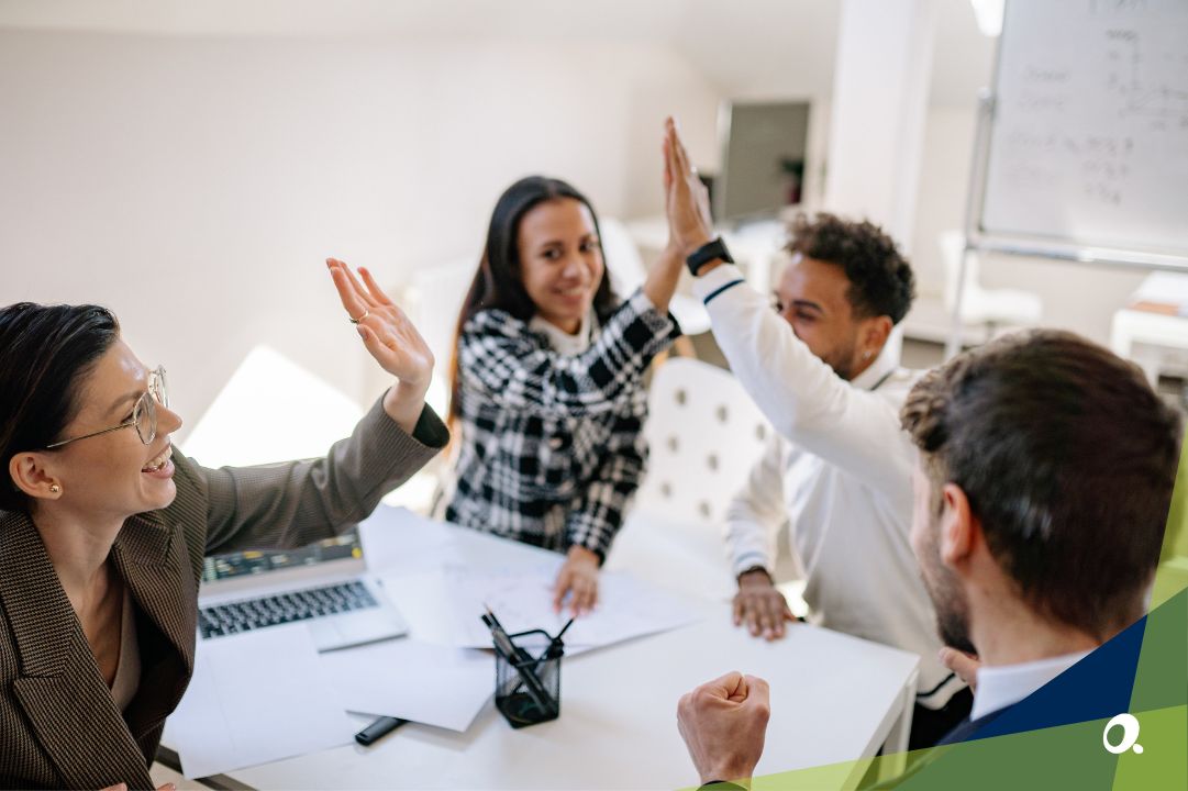 Finance team celebrating success after switching from QuickBooks to Sage Intacct, gaining efficiency and real-time insights.
