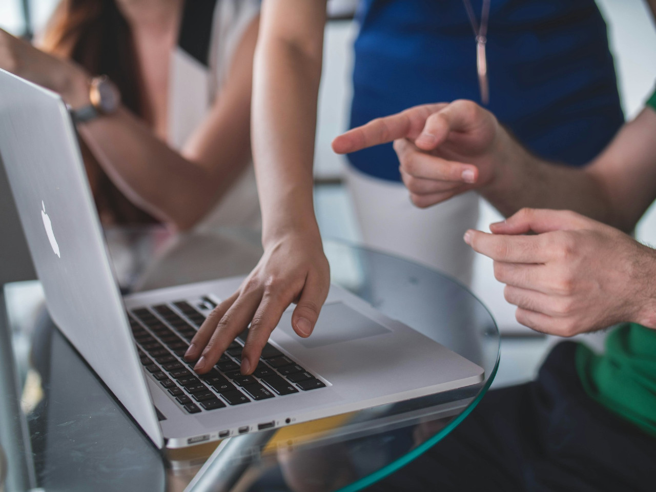 Man pointing to a laptop