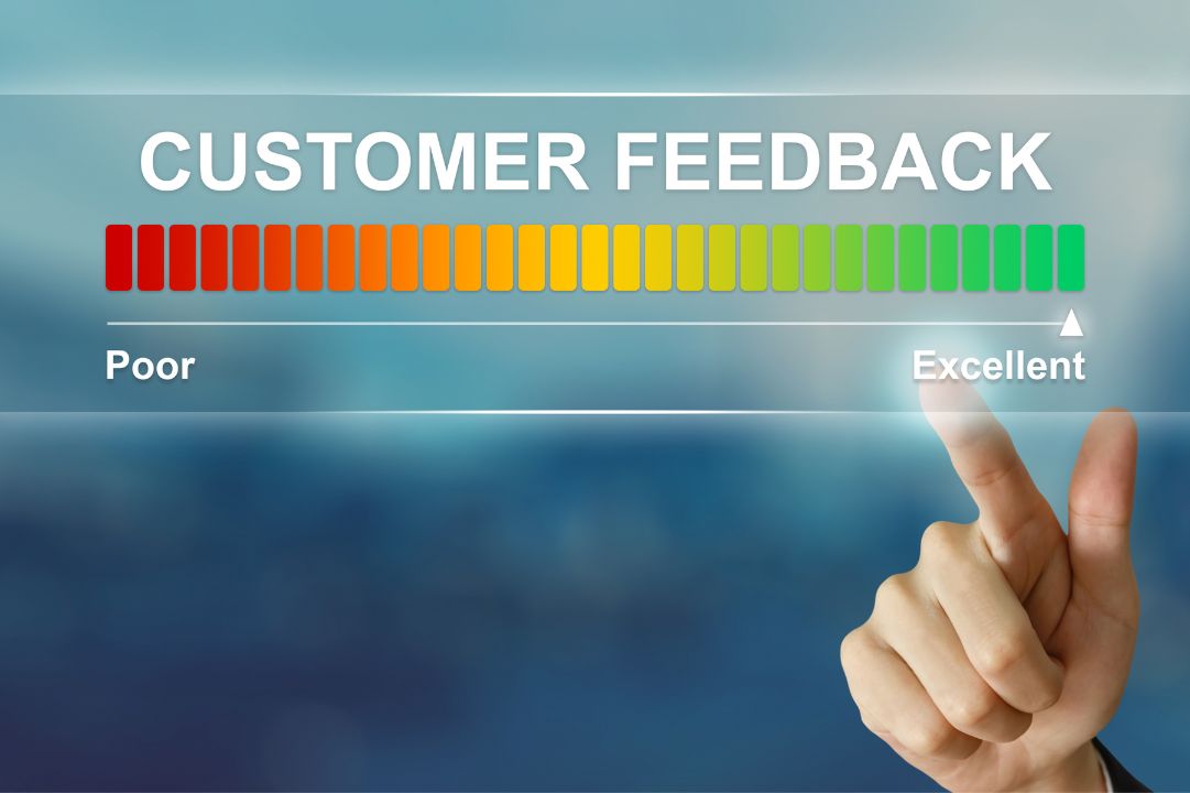 Hand touching a graphic highlighting good customer reviews